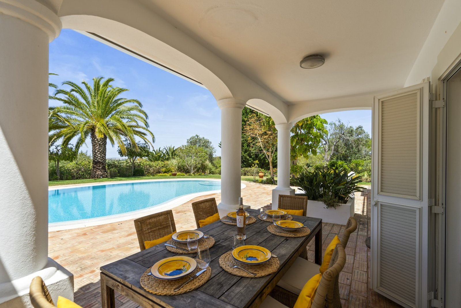 Al fresco dining under shaded arches